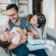 Family with daughter having fun at home